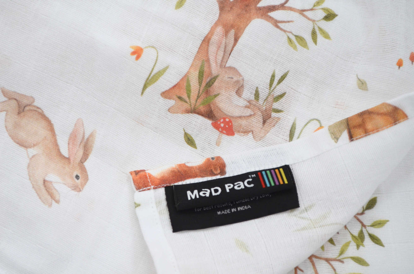 Whimsical hare & tortoise Swaddle & versatile muslin squares - perfect for parents. Soft, absorbent, and durable