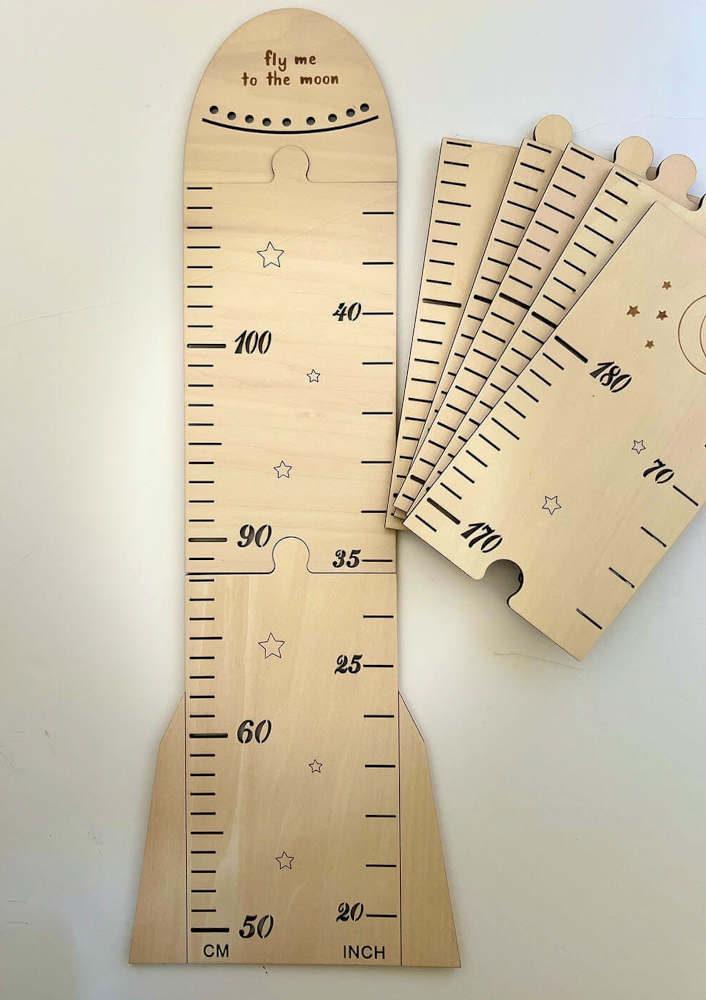 Charming rocket wooden height chart for kids. Perfect for tracking growth and adding nursery decor