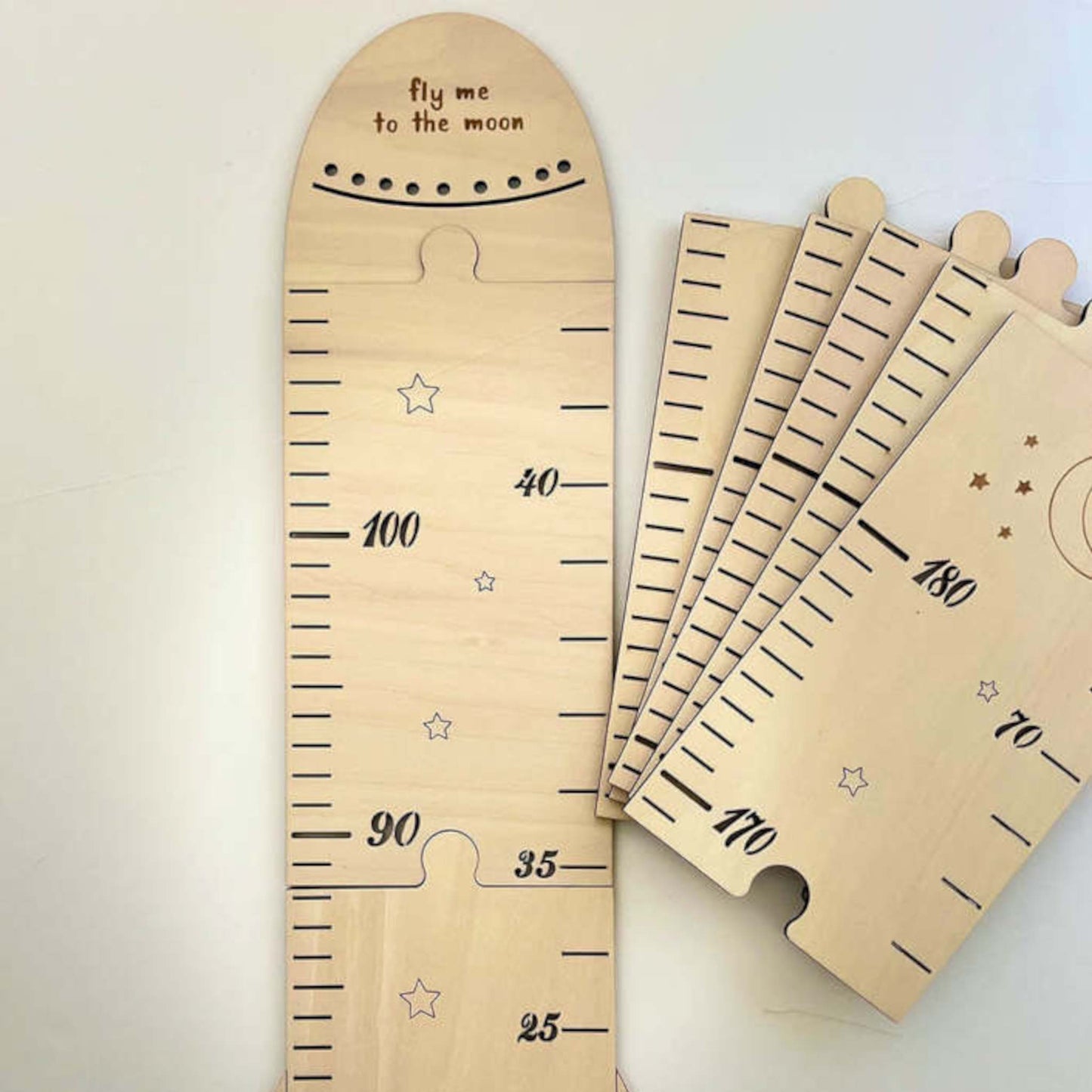 Charming rocket wooden height chart for kids. Perfect for tracking growth and adding nursery decor