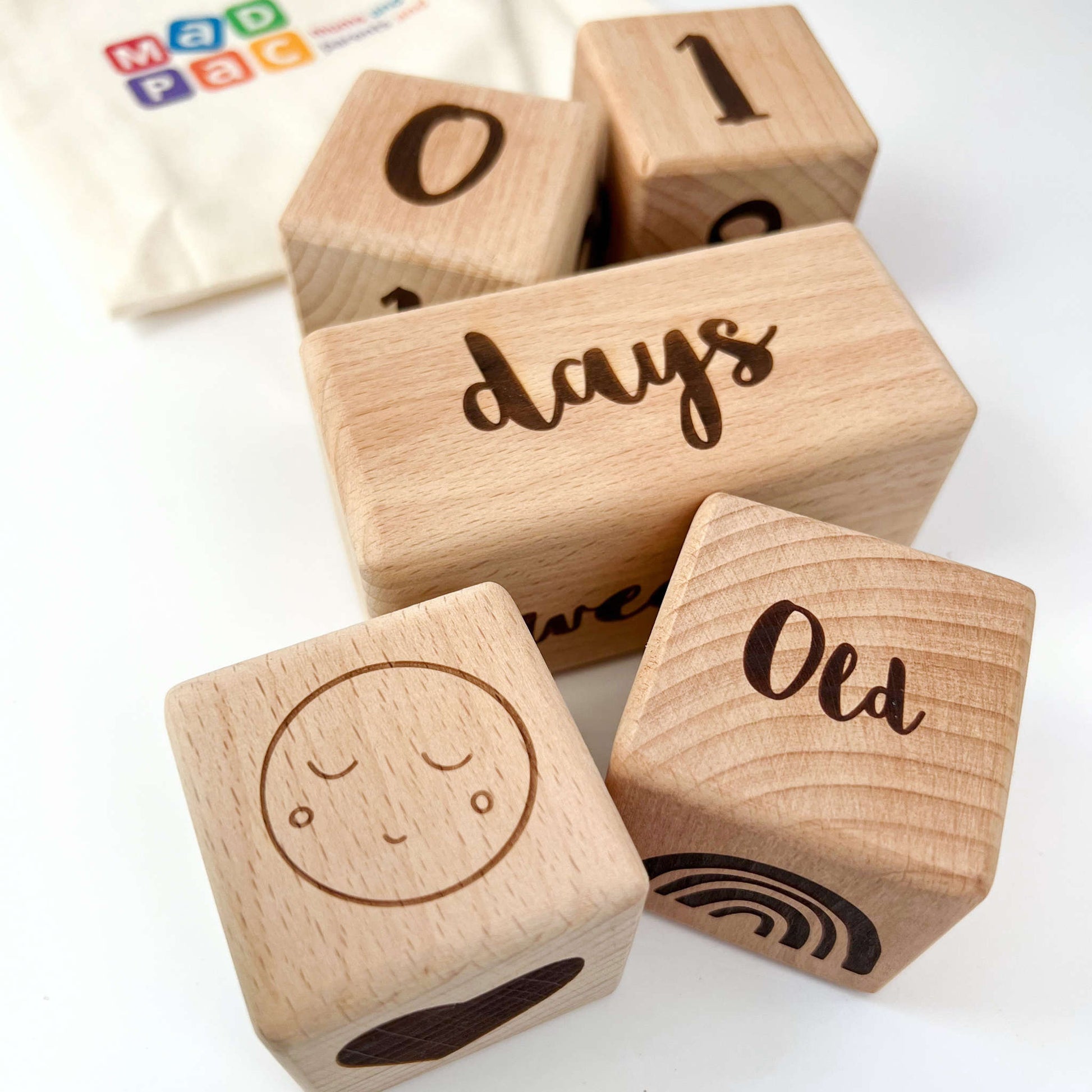 Adorable wooden blocks with rainbows, stars, and moons. Perfect for play and charming photo props